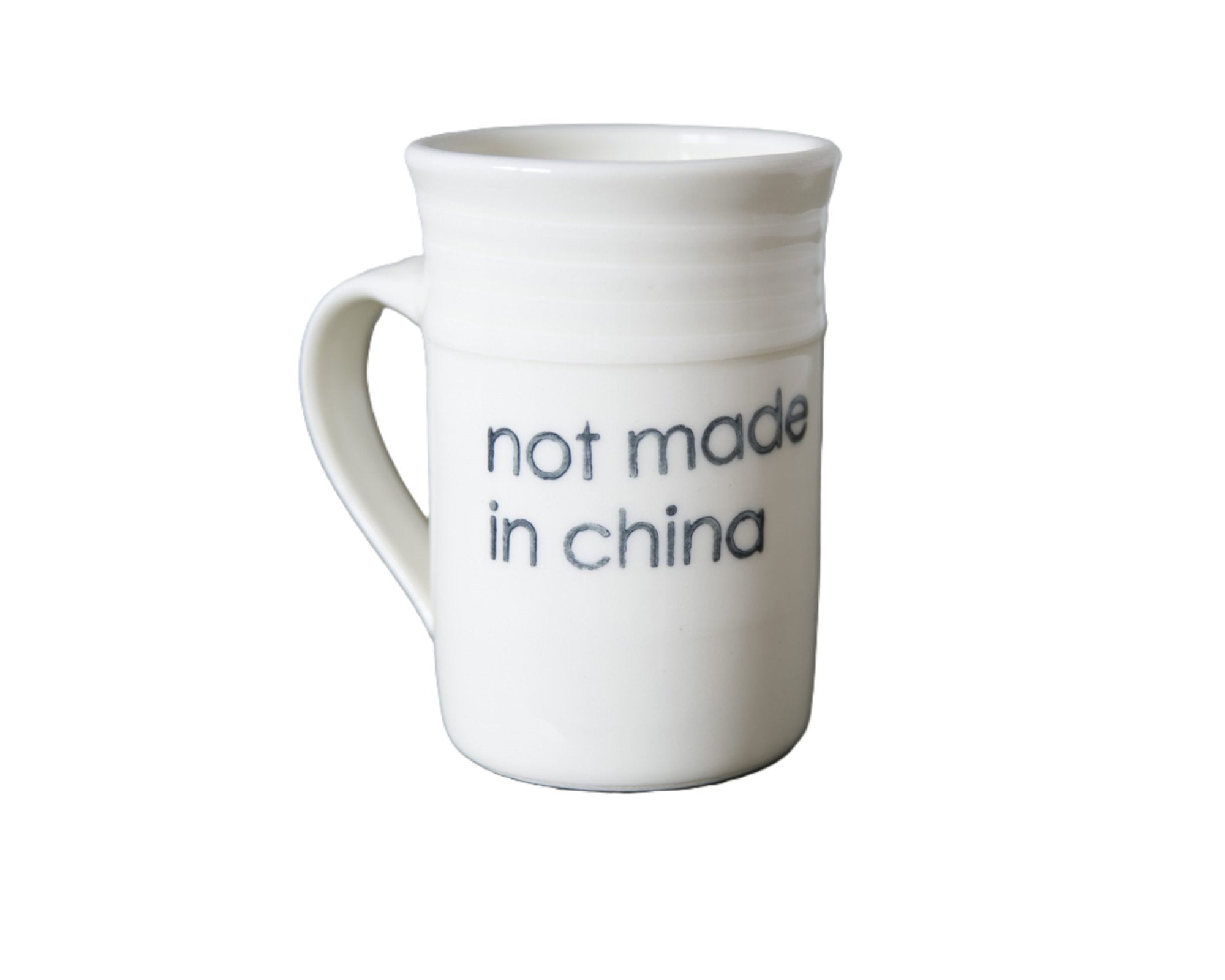 Not Made in China is printed on the side of a white bowl.