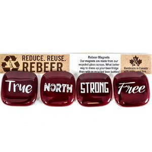 Red glass with the words True, North, Strong, and Free printed separately on each magnet