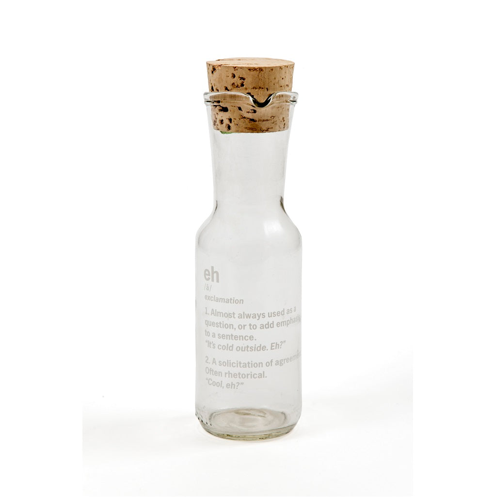 decanter with a cork stopper made from a clear bottle with the definition of the word Eh on it.