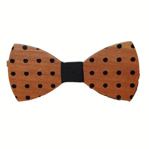 light brown wooden bow tie with black cloth center. Polka dots on the wood part