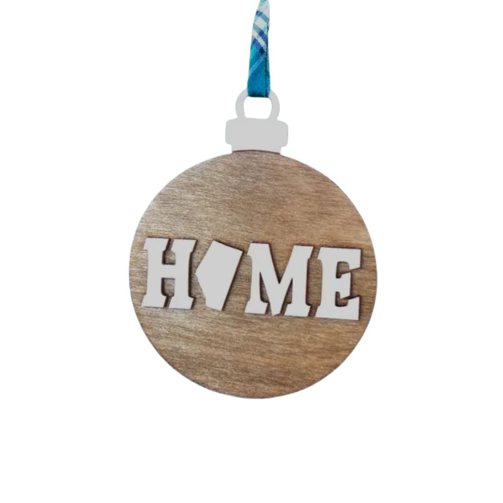 Wooden ornament with Alberta 'HOME' text on a white background