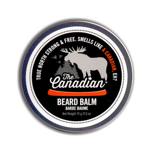 Round tin with black label which has a moose and a red canoe on it