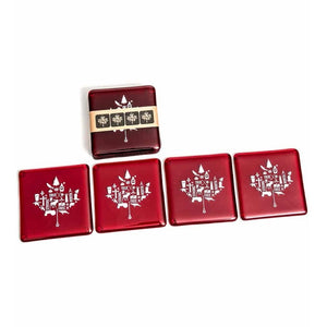 red coloured glass with maple leaf print in white. the print is made up of many iconic items