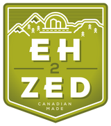 Eh-2-Zed logo it is green and white. It depicts the Rocky Mountains, Prairies, & Appalachian Mountains 