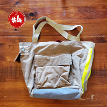 Load image into Gallery viewer, Fire Tote bag made from decommissioned fire gear, side view, beige handles
