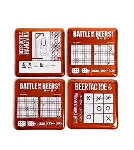 four brown coasters printed in white with a different game on each