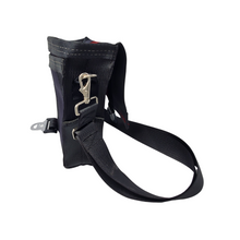Load image into Gallery viewer, side view of bag made with different coloured seatbelts showing removable strap
