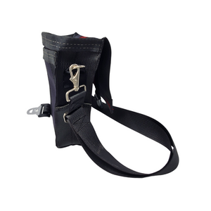 side view of bag made with different coloured seatbelts showing removable strap