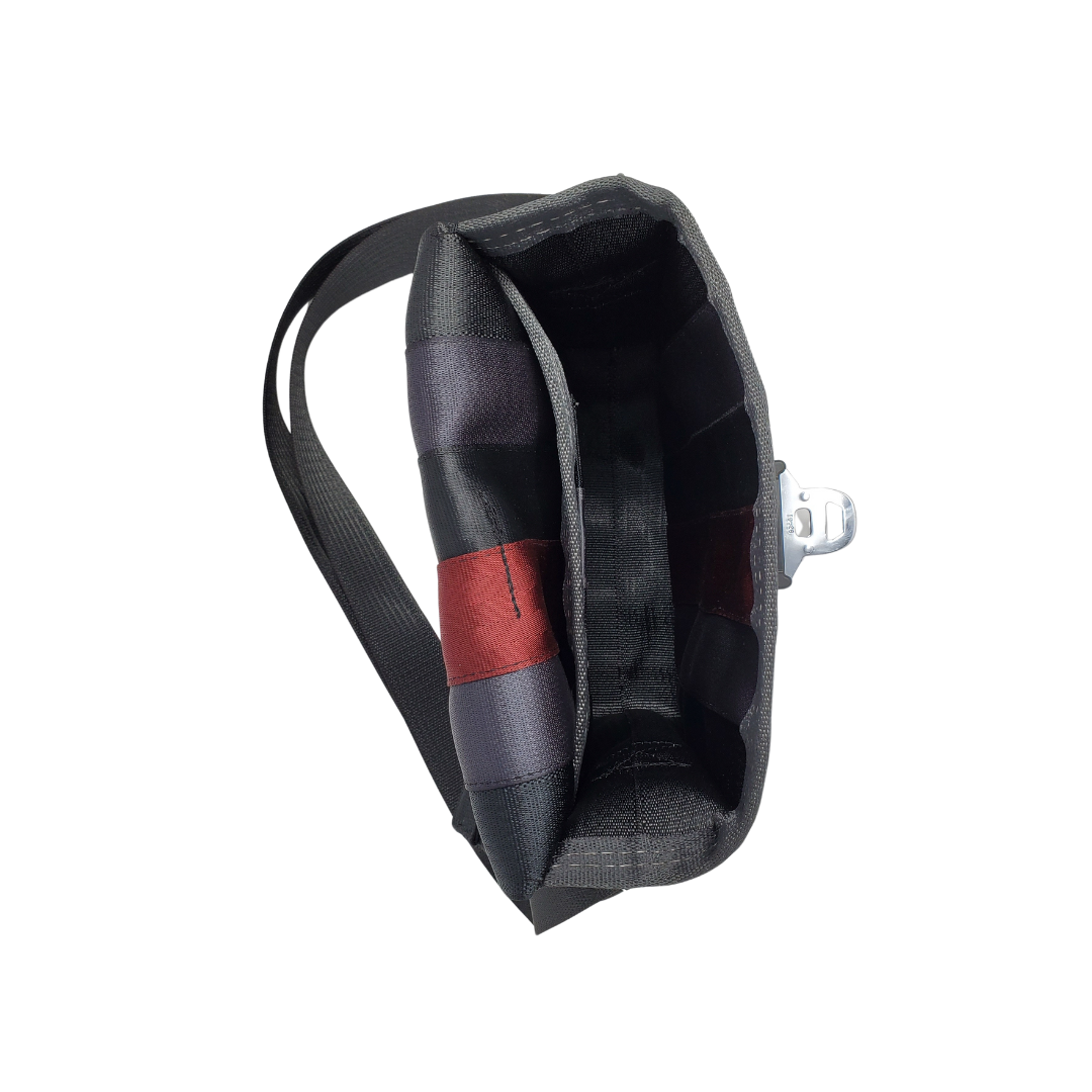 top view of bag made with different coloured seatbelts top flap open