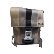 Load image into Gallery viewer, front view of backpack with buckle closure
