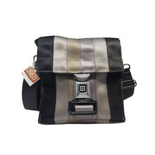 Load image into Gallery viewer, front view of bag made with different coloured seatbelts with buckle closure
