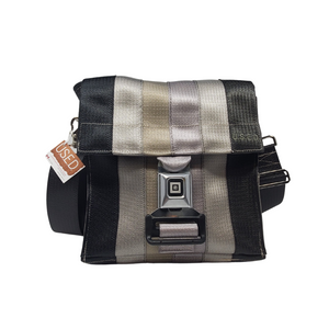 front view of bag made with different coloured seatbelts with buckle closure