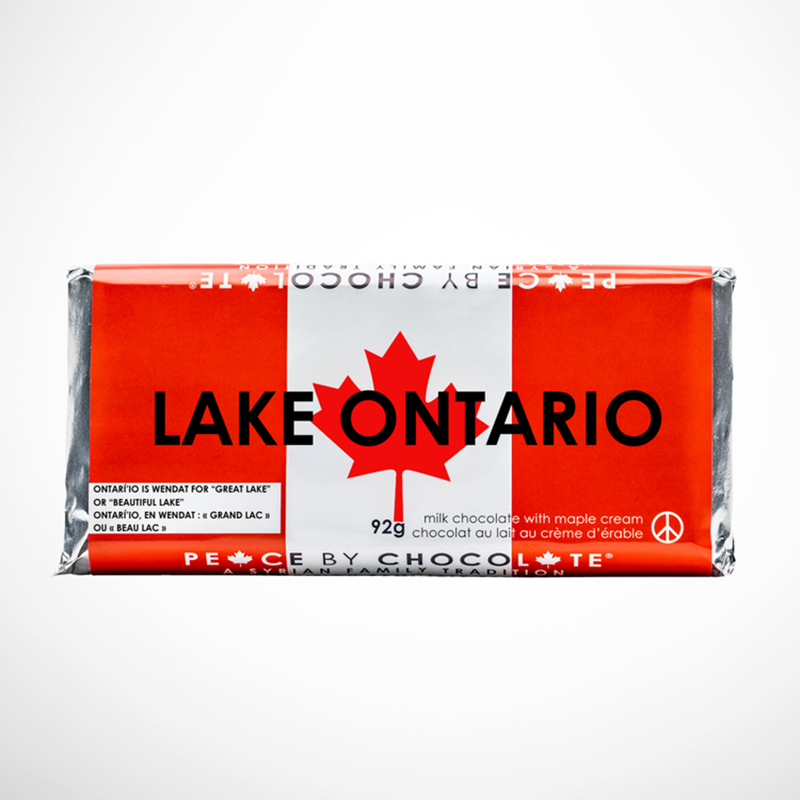 A packaged chocolate bar wrapped in a red, white, design inspired by the Canadian flag, with the text 'LAKE ONTARIO' and 'PEACE BY CHOCOLATE' visible on the front.