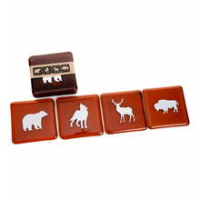 Load image into Gallery viewer, four glass coasters with animal prints on each in front of a stack of the same
