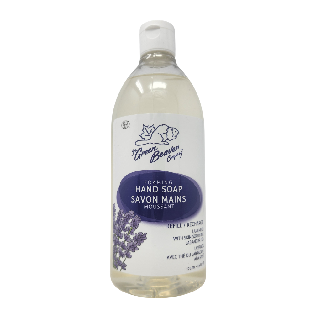 A bottle of Green Beaver Foaming Hand Soap refill, featuring a white label with purple text and lavender illustrations, filled with clear liquid, on a white background.