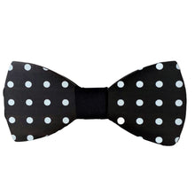 Load image into Gallery viewer, black wood cut in a smooth bow tie shape with white polka dots and dark center
