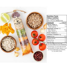 Load image into Gallery viewer, half lime, corn chips, beans, tomatoes around a bag with ingredients beside list of nutrition facts
