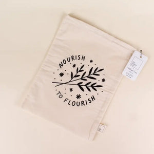 bag screen print -Nourish to Flourish and some herbs