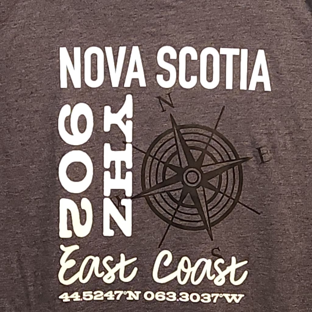 Dark gray t-shirt with 'Nova Scotia East Coast' text and compass design.
