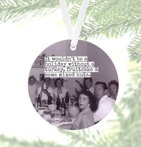 black & white photo, 1950's, of a gathering of people sitting at a table for Christmas