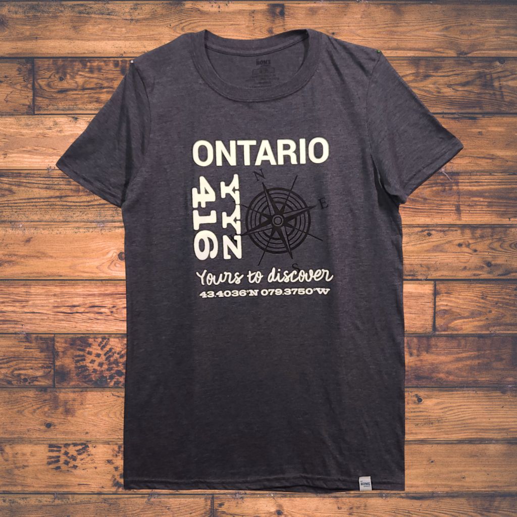 Dark gray t-shirt with 'Ontario 416' design on a wooden surface