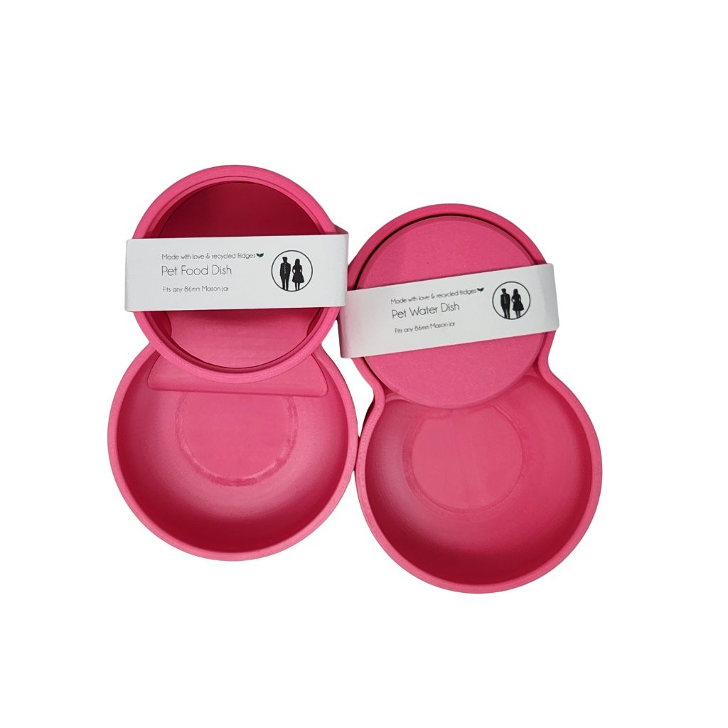 pink pet food dish with a white label on a white background