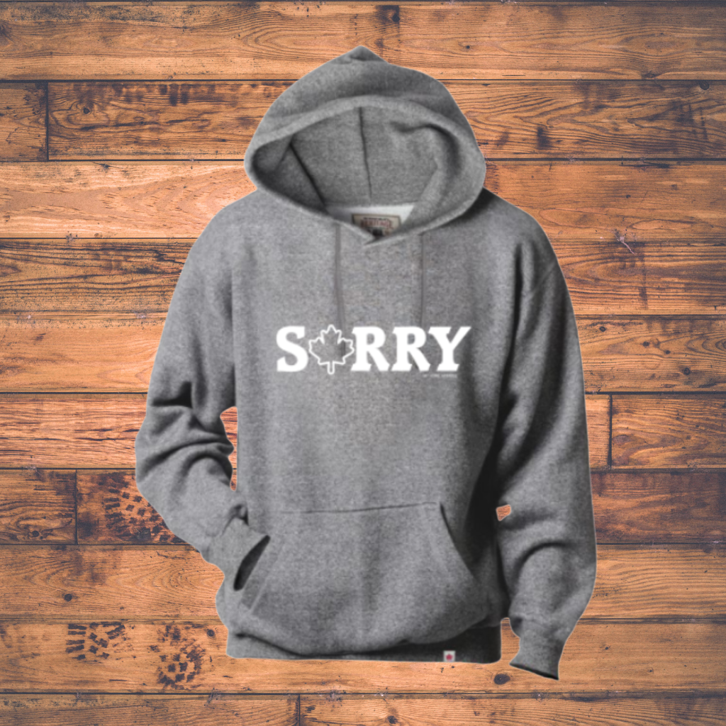 Gray hoodie with 'SORRY' text on a wooden background