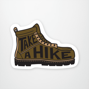 side view of a brown hiking boot with black lettering