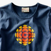 Load image into Gallery viewer, upclose to a navy blue shirt that has a cbc print in yellows and oranges on the front
