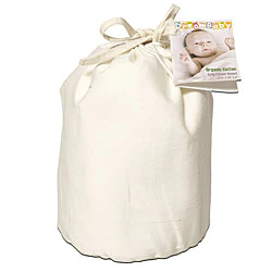 cloth cylinder type bag tied at the top with a tag attached that has a picture of a baby