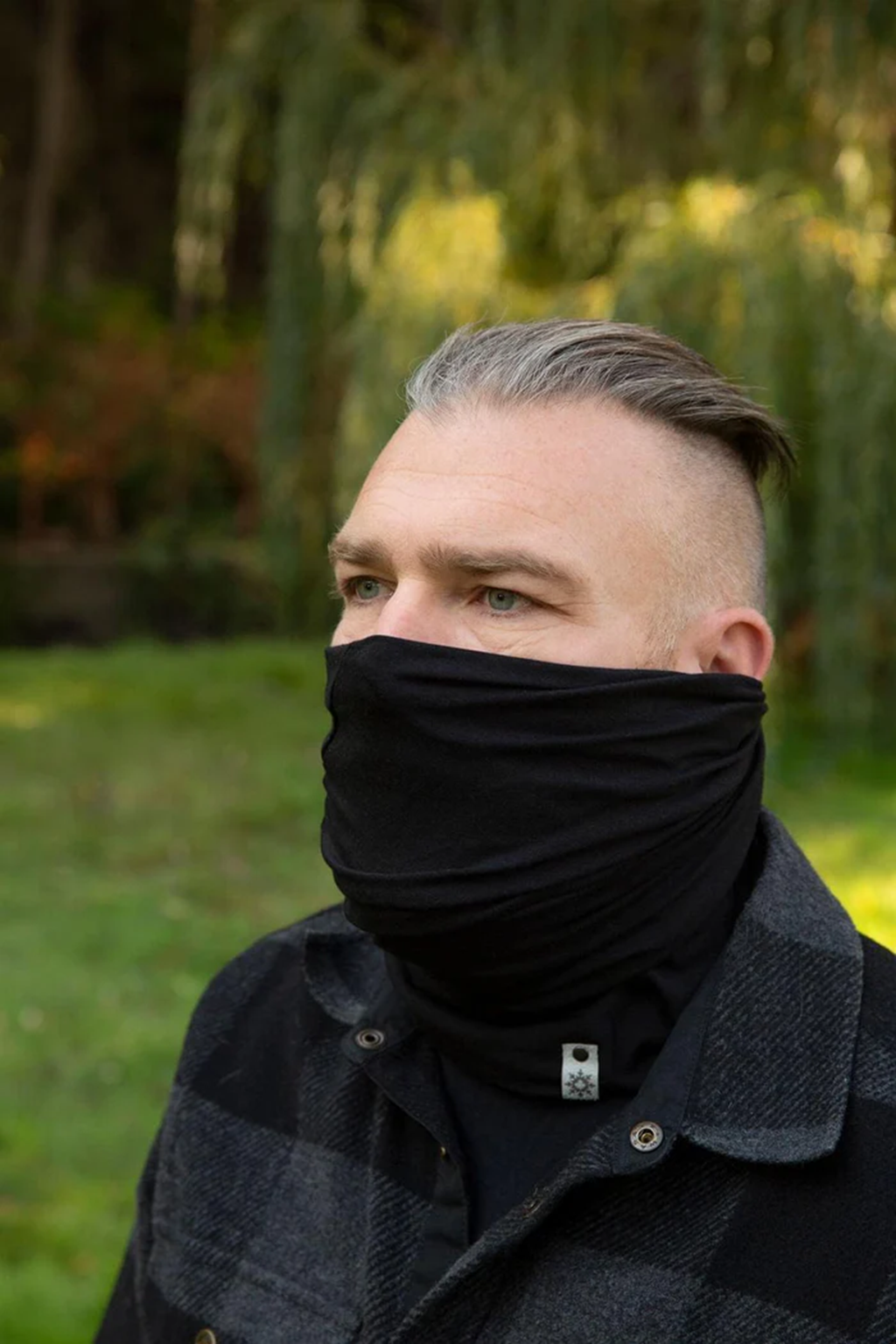 Man with beard wearing an Adult 5 Way Beanie outside as a face warmer