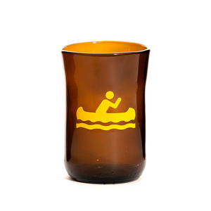Brown glass cup with a canoeing symbol on it in yellow