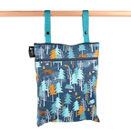 Double Duty Wet Bag hanging from straps with front and top zippers