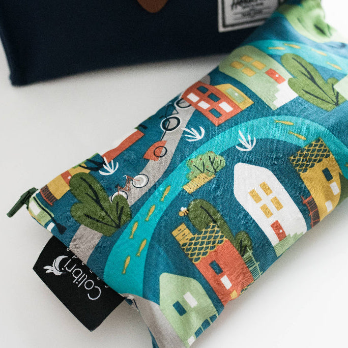 Colibri Canada Urban Cycle Reusable Snack Bag - Medium laying on table