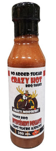 White label with red and black print and picture of a cartoon Moose head on a bottle of sauce