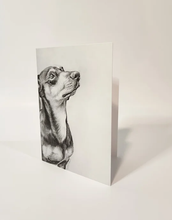 Load image into Gallery viewer, Dachshund on the front of a card looking up
