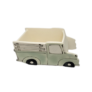 ceramic planter that looks like a green pick up truck