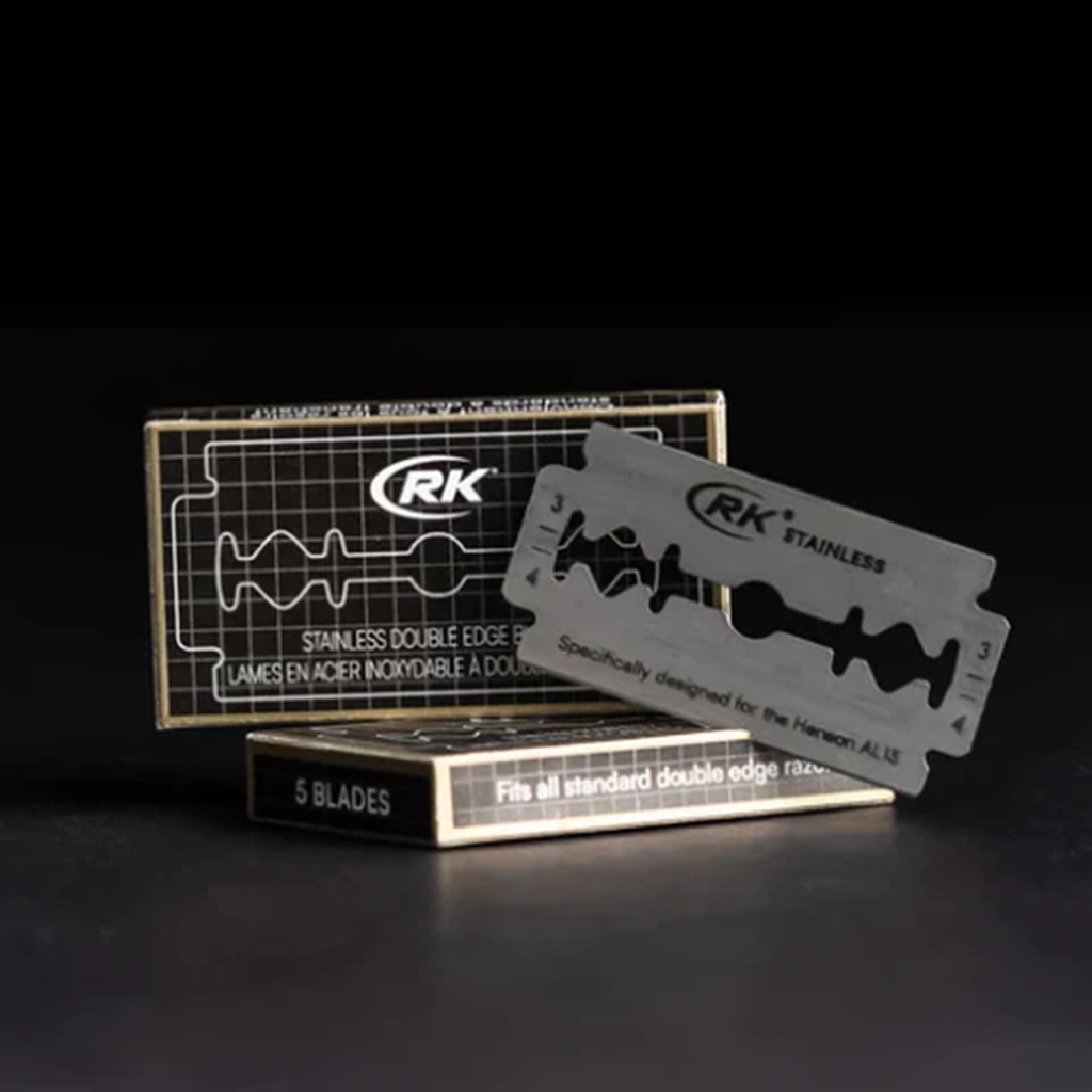 Black background with black box with white print & blade beside