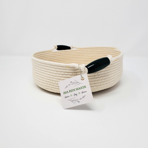 side view of rope bowl with dark green bead handles