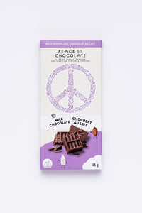 chocolate bar in a purple and white wrapper with a peace symbol on it