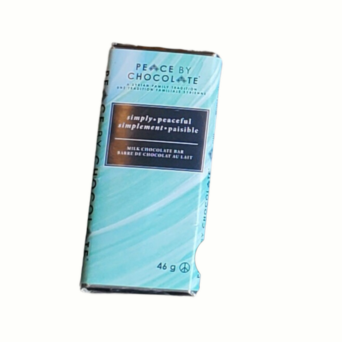 blue wrapping with brown rectangle that has simply peaceful written on it in English and French