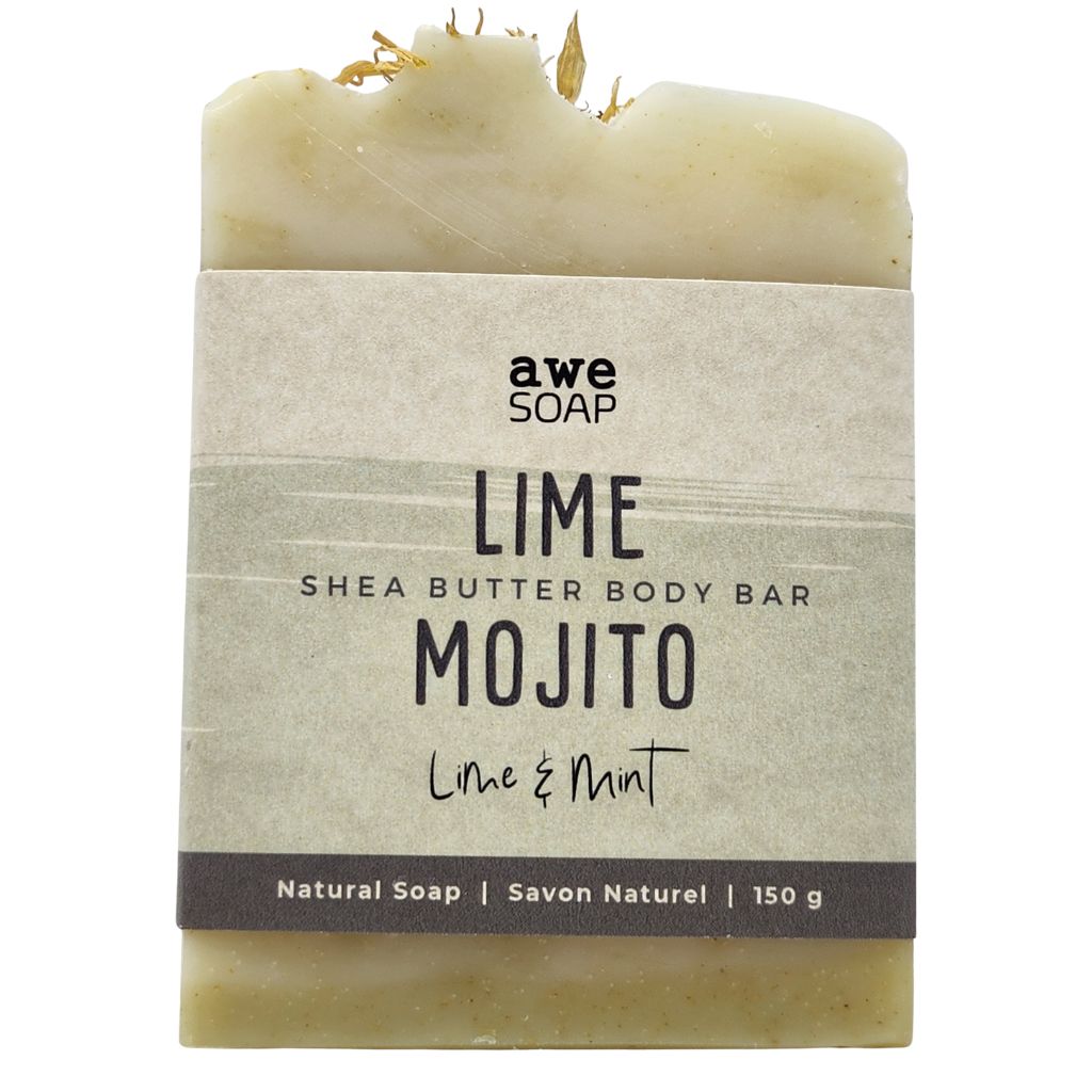 close up of handmade bar of soap with paper sleeve