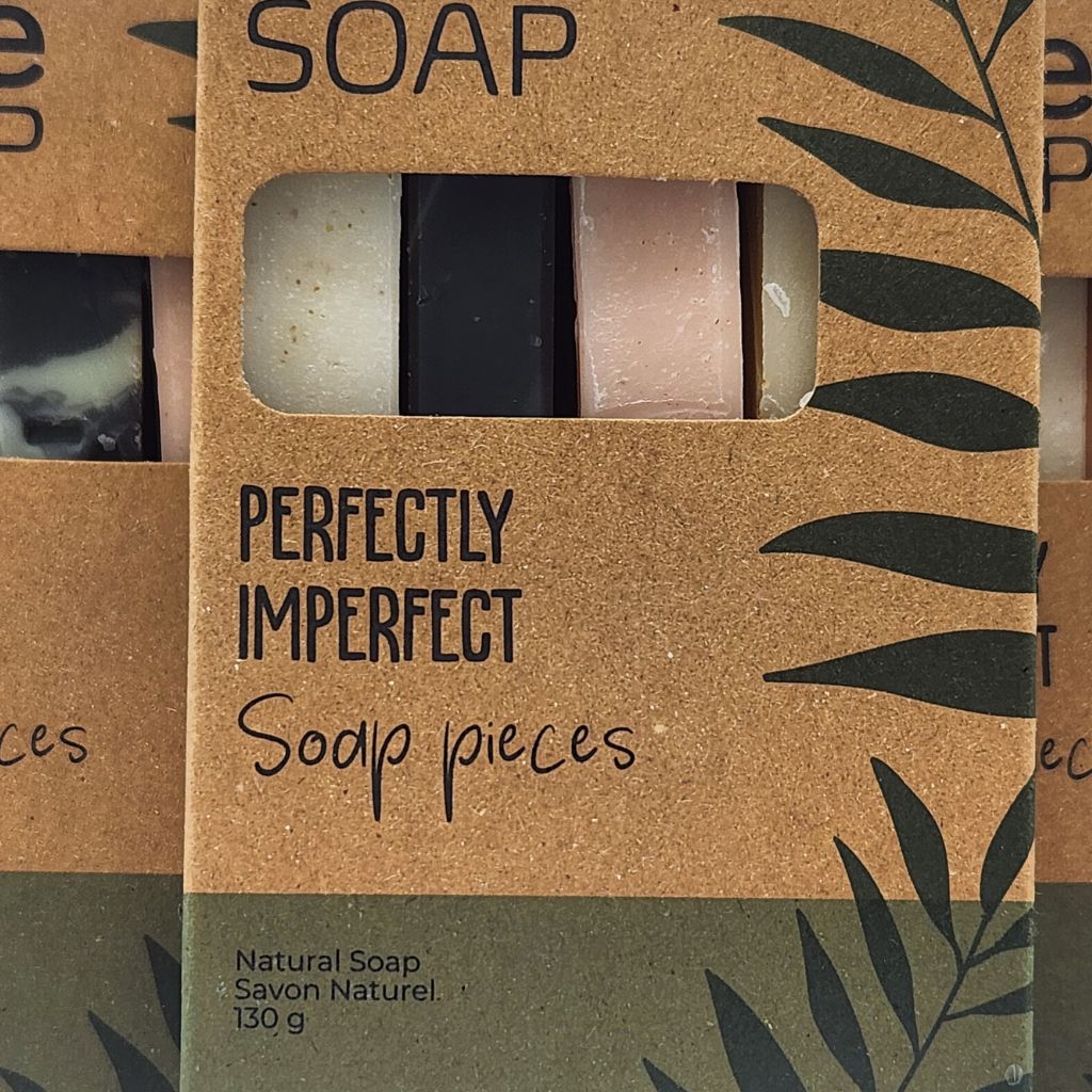 close up of a brown & green box of hand made soap ends