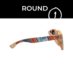 Side view of wooden sunglasses on white background
