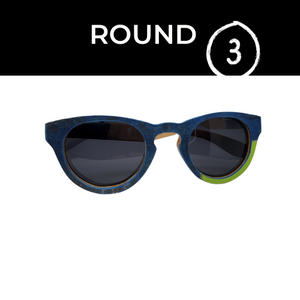 Wooden sunglasses on a white background with a black boarder at the top of the picture