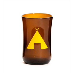 brown glass cup with yellow tent symbol on it