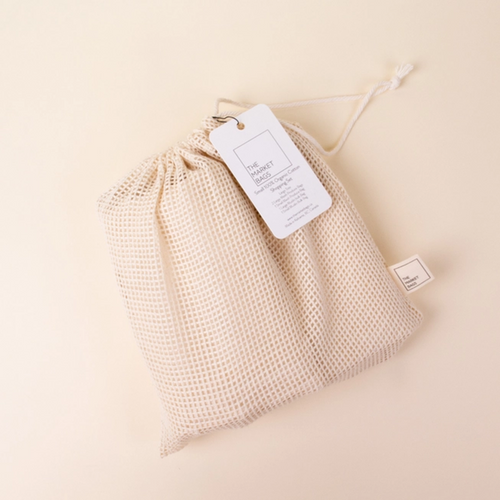 A mesh bag with white tag, the bag has a drawstring