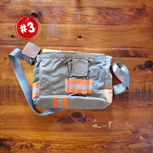 Load image into Gallery viewer, Messenger Bag made with decommissioned fire gear, side view, orange stripes
