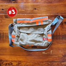 Load image into Gallery viewer, Messenger Bag made with decommissioned fire gear, side view, orange stripes
