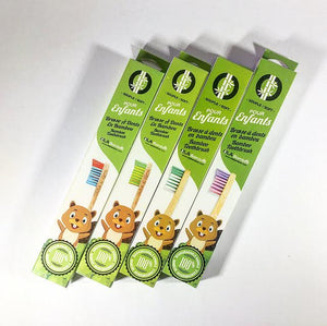 four boxed tooth brushes each with a different coloured brush and a beaver on the front